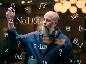 Noll–100 – en utmaning i samarbete Man skriver matematiska formler på en glasvägg under konferensaktiviteten Noll–100.